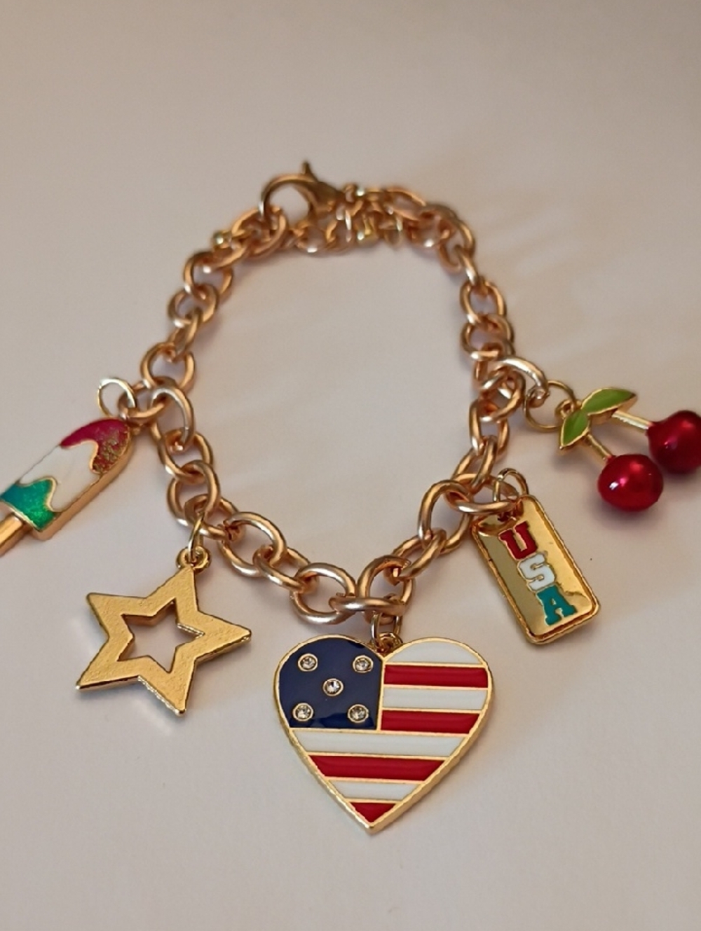 Gold-Tone Charm Bracelet with Red, Blue & White USA Heart and Enamel Charms